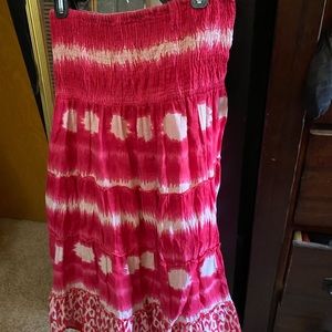 This can either be a tube top dress or a skirt it could be worn as either.